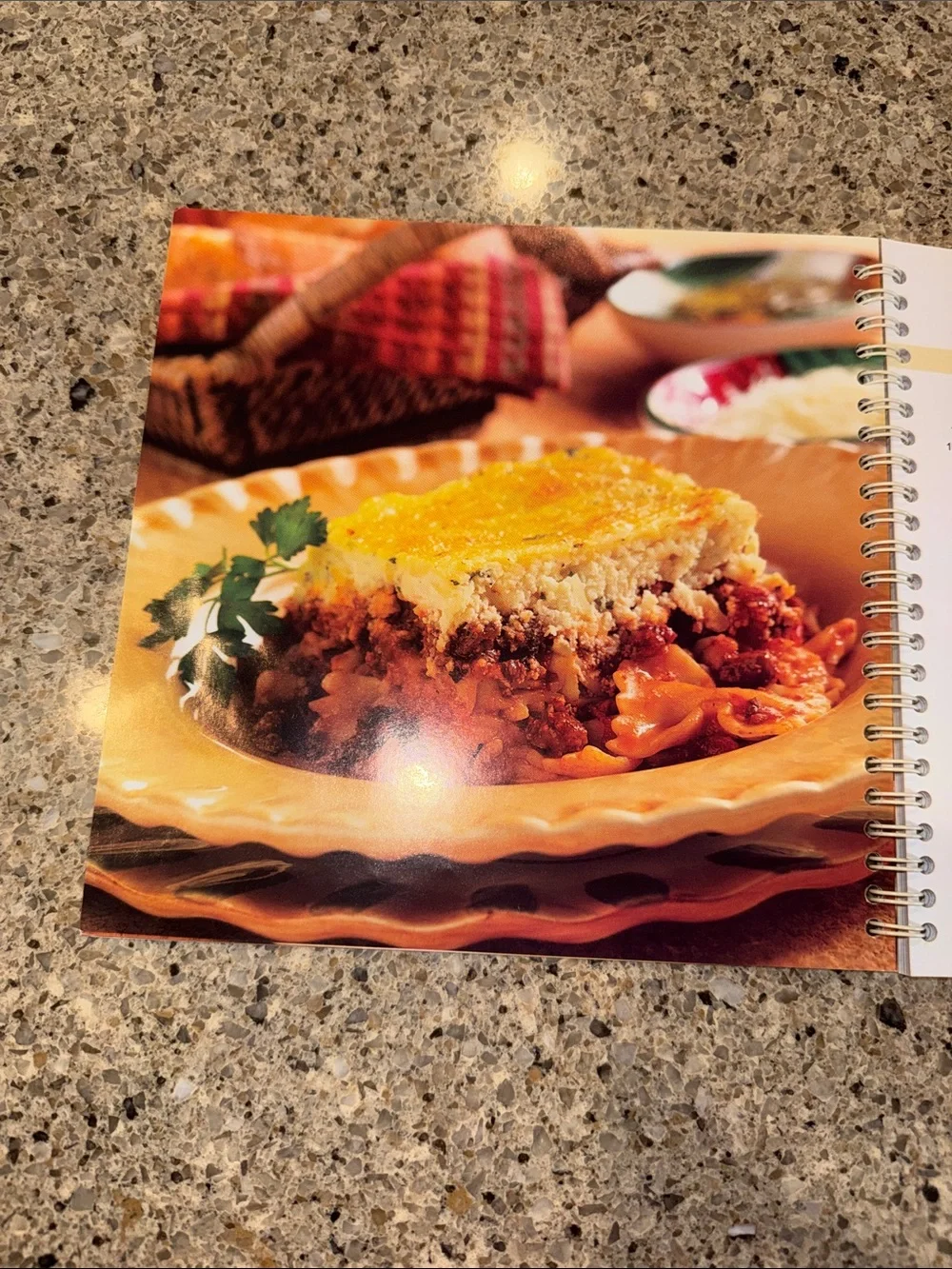 The Pampered Chef Stoneware Inspirations Cookbook - White Cover with Red Accents